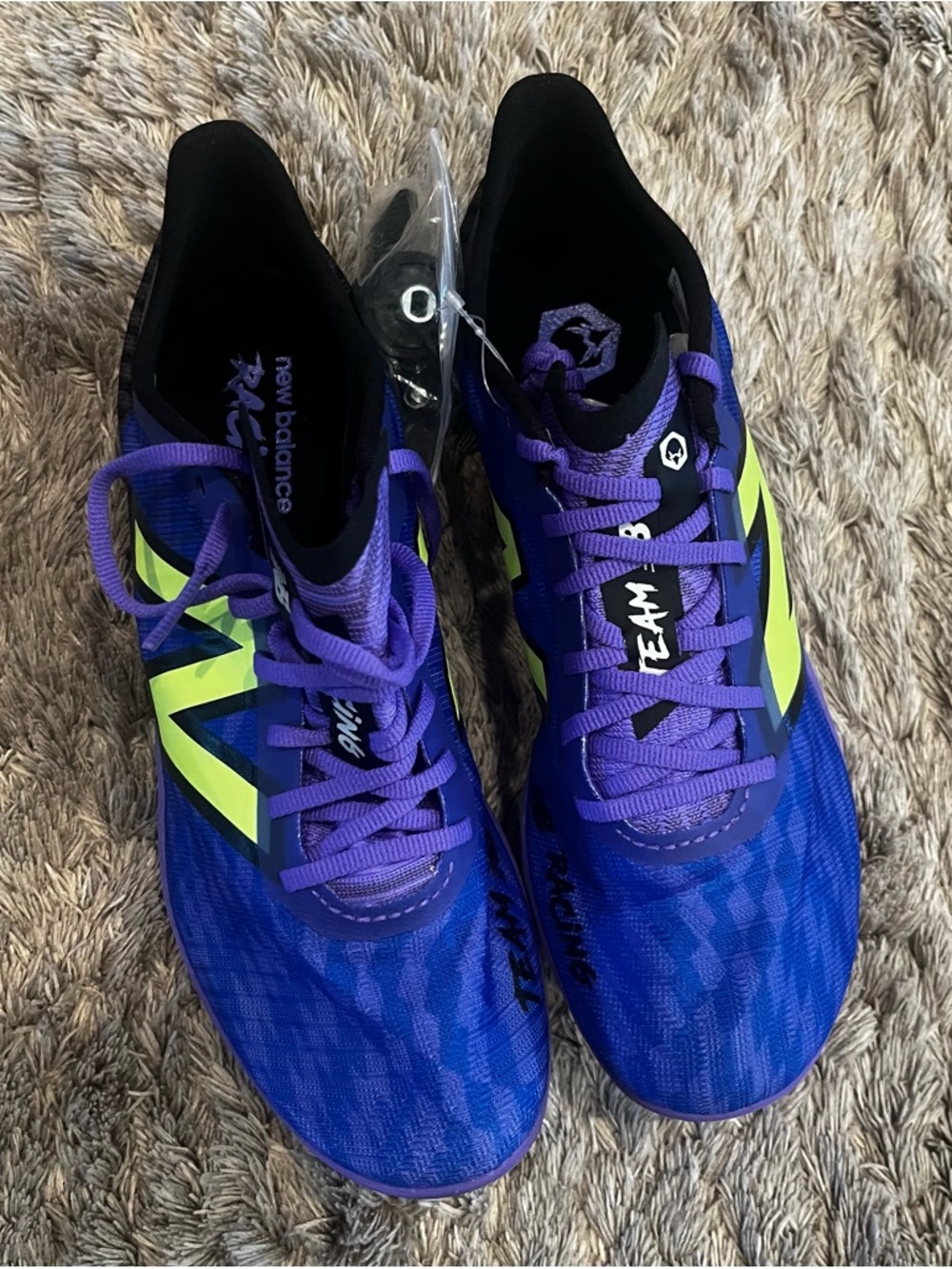 New Balance Blue and Purple Spikes with Neon Accent
